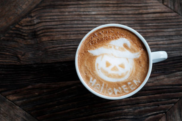Halloween Pumpkin Cappuccino coffee art. stock photo
