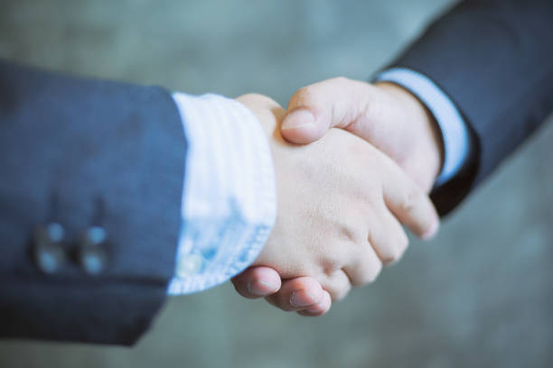 istock Business partnership handshake for deal business project 833159174