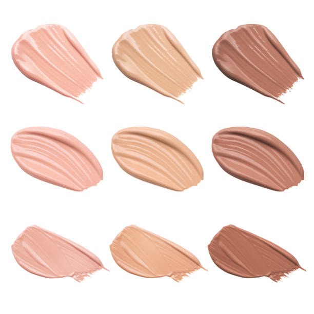 foundation Smears of foundation for face.A smear of lipstick. Cosmetic smear of liquid. Isolated on white background woman mascara smudged stock pictures, royalty-free photos & images