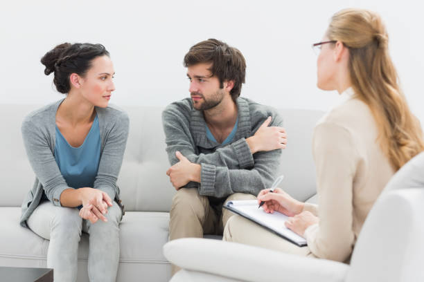 istock Couple in meeting with a relationship counselor 833169936