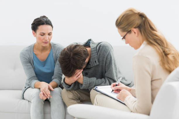 istock Couple in meeting with a relationship counselor 833170096