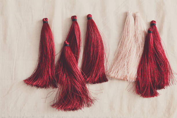 istock Red and white tassels line close up 833170422