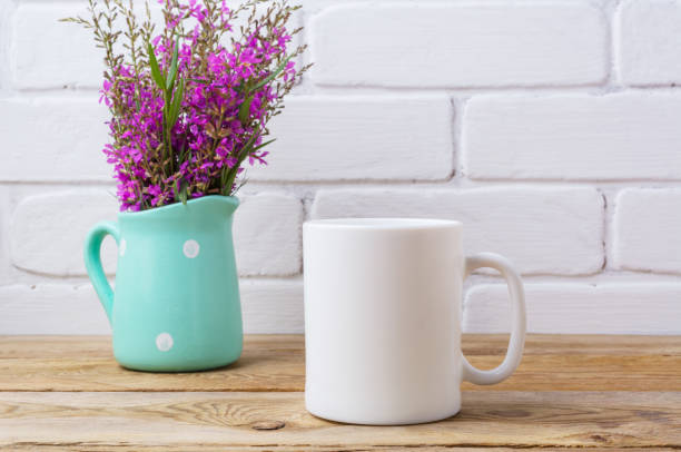 White coffee mug mockup with maroon purple flowers in mint pitcher