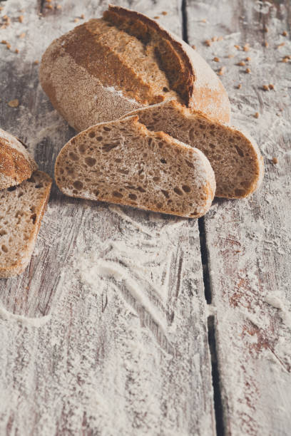 istock Bakery concept. Plenty of sliced rye bread background 833174928