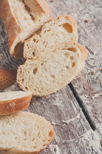 istock Bakery concept. Plenty of sliced white bread background 833175076