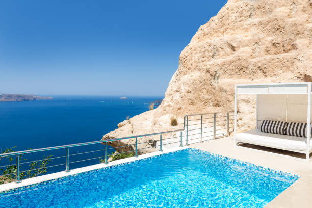 istock Sun bed & swimming pool & Aegean sea 833212520