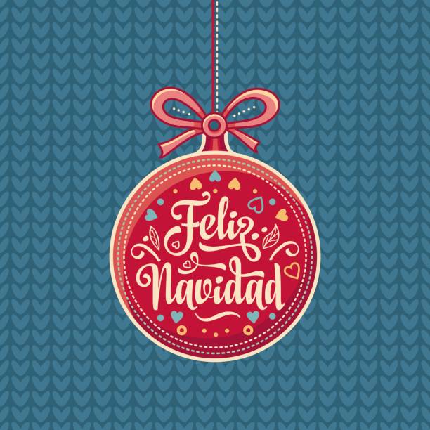 feliz navidad.  czerwona świąteczna piłka z dobrymi życzeniami w języku hiszpańskim. - navidad stock illustrations