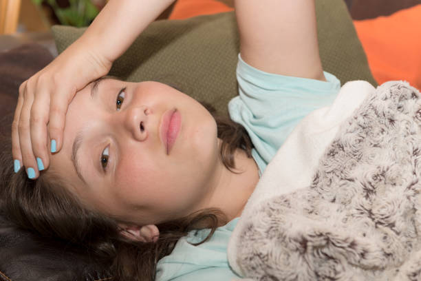 istock Young cute Caucasian girl have a headache 833217370