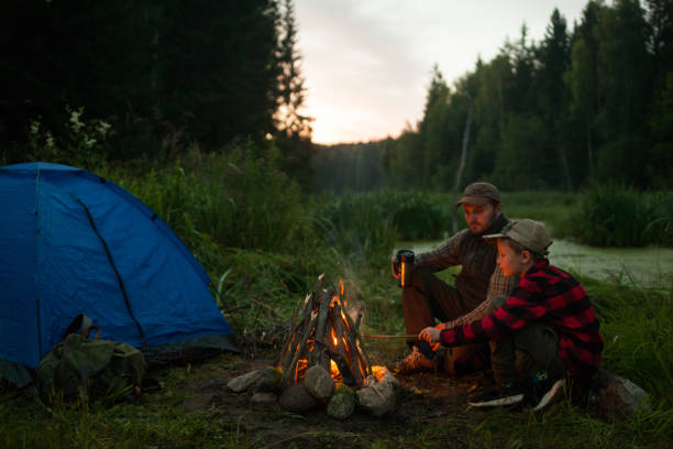 istock Father and son camping together 833226612