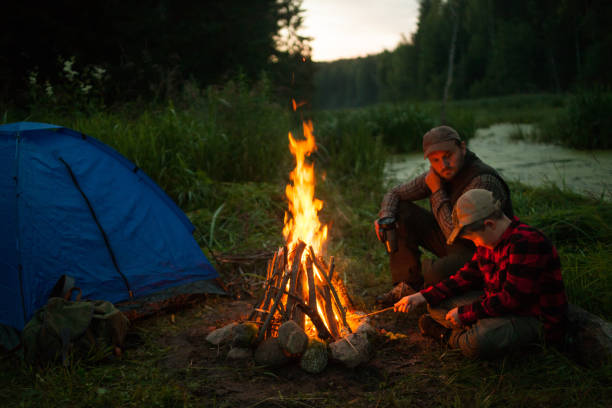 istock Father and son camping together 833226676