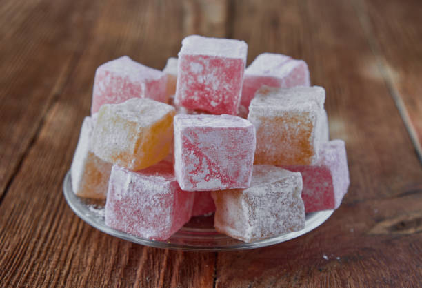 istock Delicious turkish delight on a wooden background 833226702
