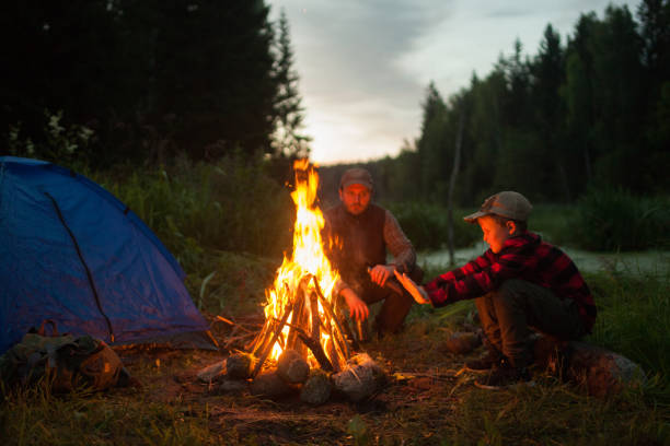 istock Father and son camping together 833226716