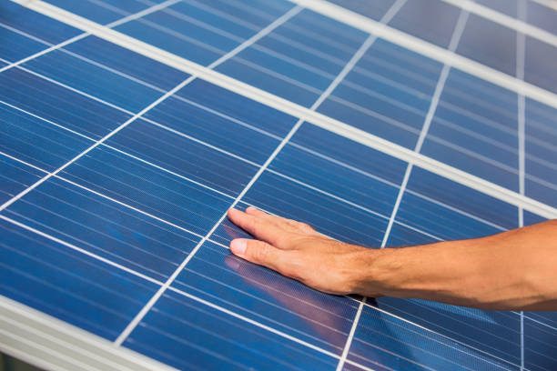 istock Solar panels on the sky background. Solar power plant. Blue solar panels. Alternative source of electricity. 833234504