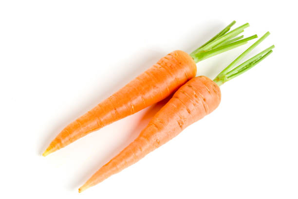 istock Carrot vegetable with leaves isolated on white background 833237002