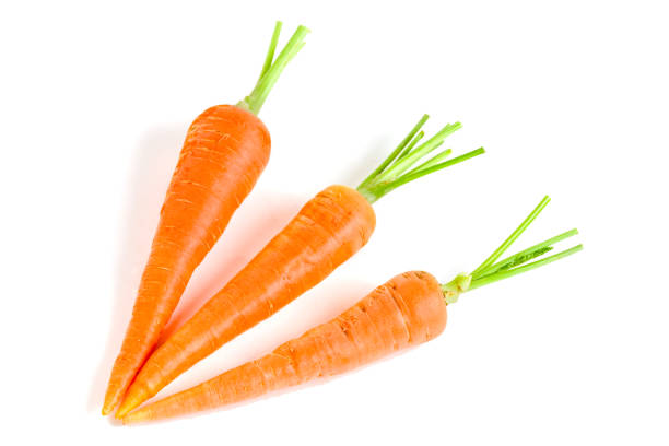 istock Carrot vegetable with leaves isolated on white background 833237064