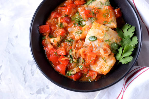 istock White sea fish stewed with onion 833241208
