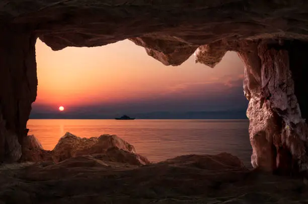 Photo of View of the sunset from the cave inside in Thasos, Greece
