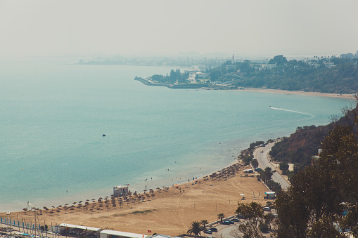top view of beach and city ahead