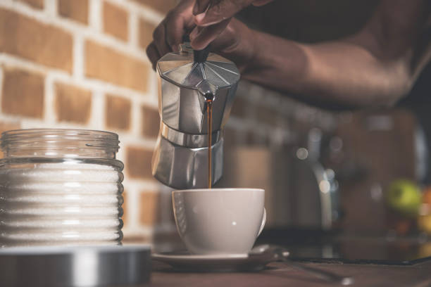 istock African american man preparing coffee 833270176