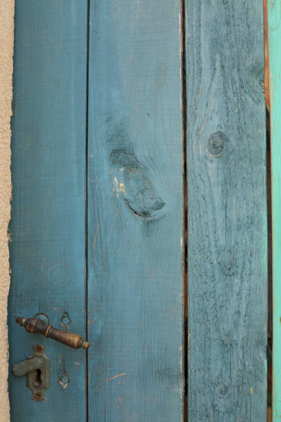 istock Old door with lock, Old wood texture, Blue background 833273636