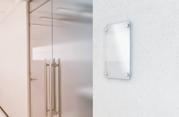 istock Blank vertical transparent glass sign plate mock up 833280652