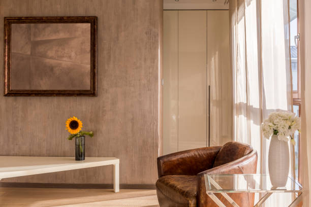 istock Stylish interior with leather armchair 833281232
