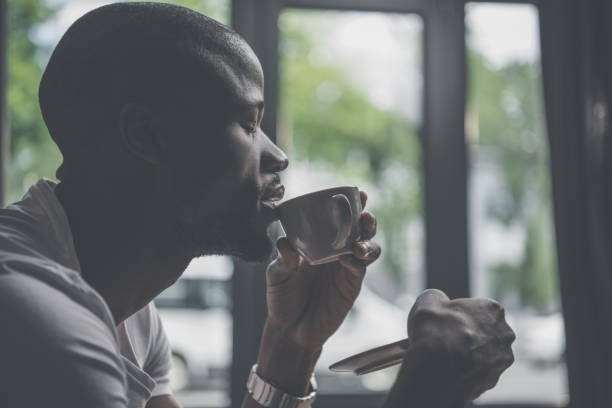 istock african american man with coffee 833292110