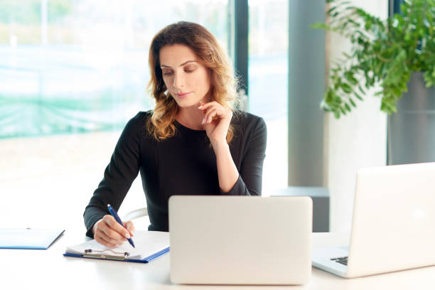 istock Managing her business at the office 833292288