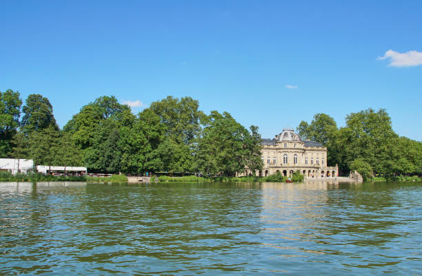 Ludwigsburg, Germany - June 10th, 2017: The Monrepos Castle and its lake during the annual fish festival. Ludwigsburg, Germany - June 10th, 2017: The Monrepos Castle and its lake during the annual fish festival. seeschloss stock pictures, royalty-free photos & images