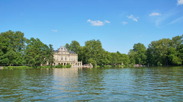 Ludwigsburg, Germany - June 10th, 2017: The Monrepos Castle and its lake during the annual fish festival. Ludwigsburg, Germany - June 10th, 2017: The Monrepos Castle and its lake during the annual fish festival. seeschloss stock pictures, royalty-free photos & images