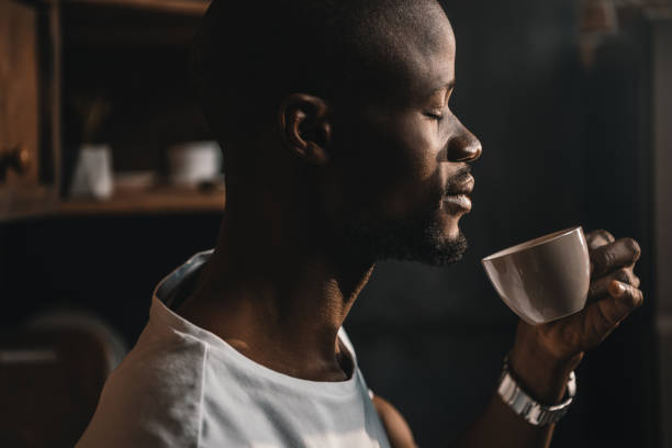 istock african american man with coffee 833299190