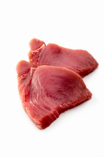 fish: two fresh tuna steak on white background - tuna tuna steak raw freshness imagens e fotografias de stock