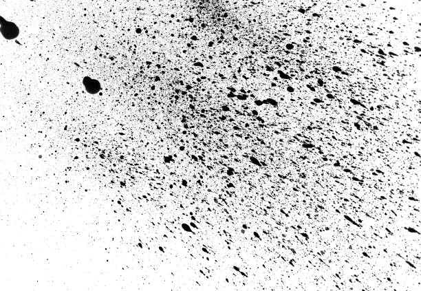 istock Spray of black ink on white background 833328210