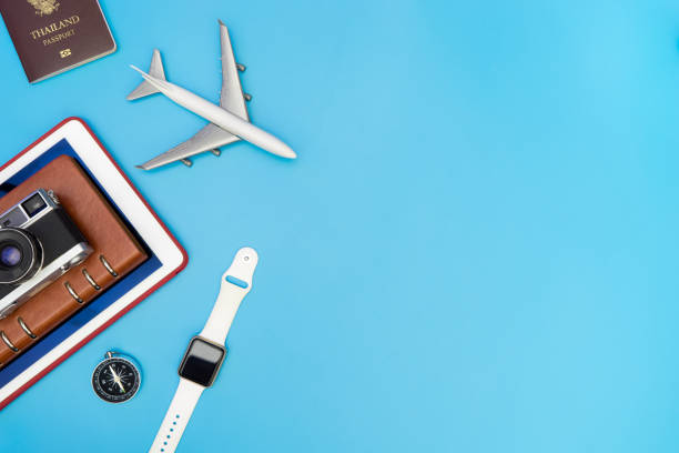 istock Travel Technology gadget and accessories on blue copy space 833332742