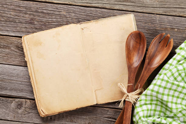 istock Blank vintage recipe cooking book and utensils 833343374