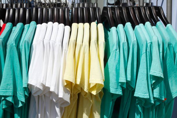istock Colorful T-shirts on hangers 833358538