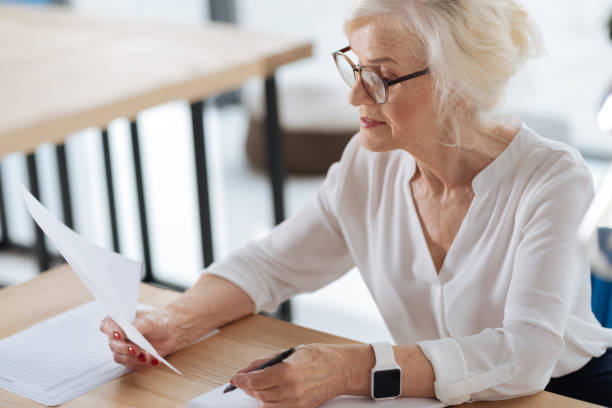 istock Intelligent experienced woman being at work 833383542