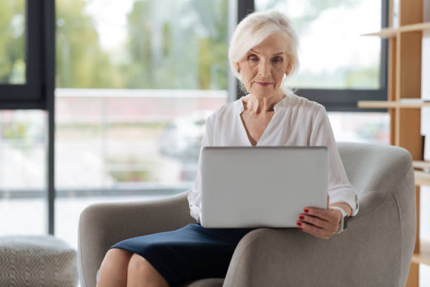 istock Smart experienced businesswoman working on the laptop 833390904