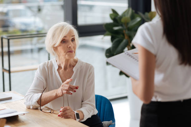 istock Nice experienced businesswoman giving instruction 833405182