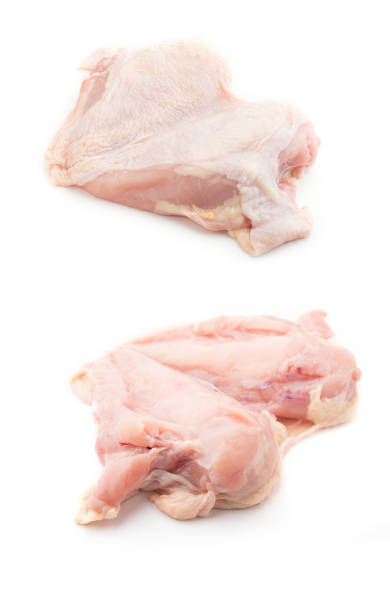 istock Raw chicken fillet breast isolated on white background. 833414574