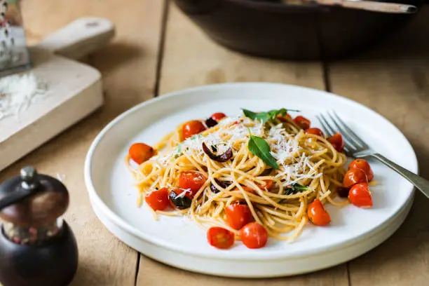 Spaghetti with Cherry tomatoes and dried chili with grated Parmesan