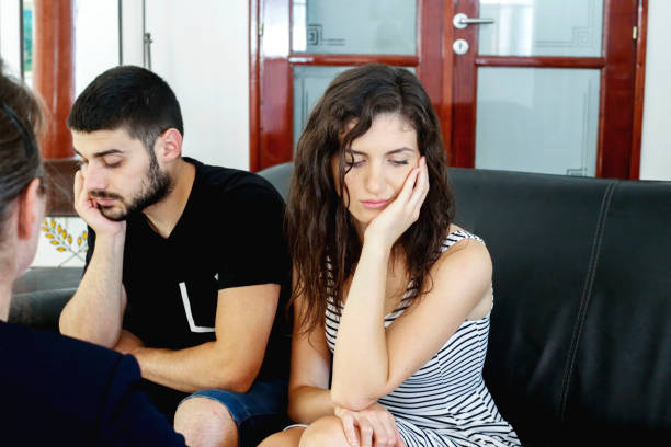istock Young couple with a problem to consult a psychologist 833461682