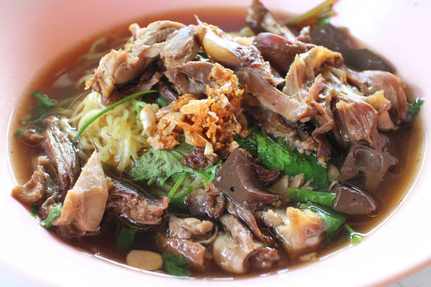 istock Egg noodles with  stewed  duck meat 833481498