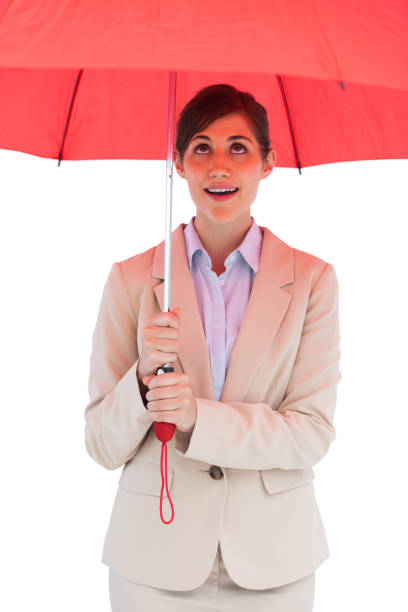 istock Young businesswoman with red umbrella 833482712