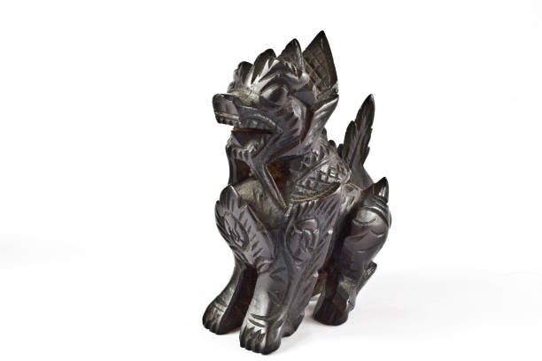 istock Chinese Dragon Dog Statue on White Background 833496598