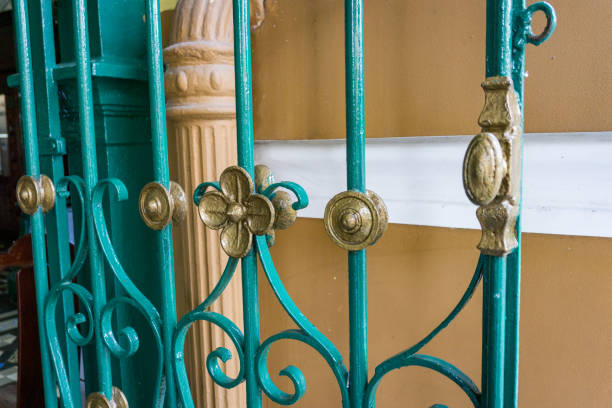 istock Iron fence volute outdoor perspective in selective focus 833512380