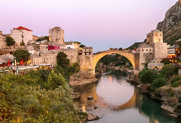 Mostar at golden hour Old Bridge in the heart of the Old City of Mostar at golden hour, Bosnia and Herzegovina. stari most mostar stock pictures, royalty-free photos & images