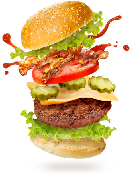 bacon cheeseburger flying on white background - take out food fast food vertical tomato imagens e fotografias de stock