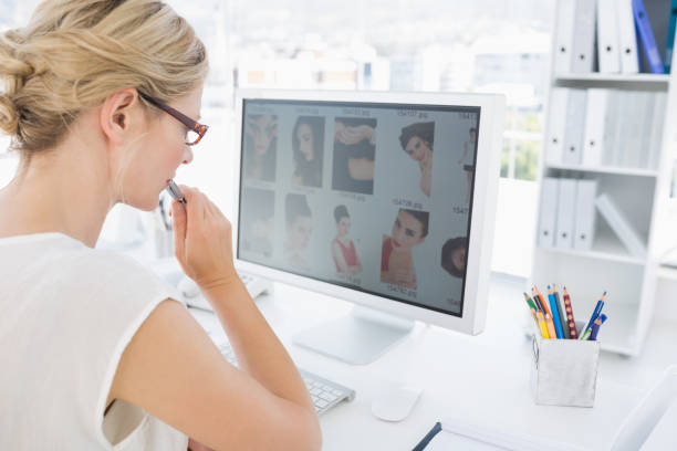 istock Rear view of a female photo editor working on computer 833533038