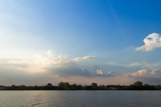 istock peaceful riverside city landscape in country side. 833533722